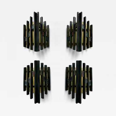 Pair of mid-century modern wall sconces in hammered glass, yellow glass and iron, with a gold and copper patina. They are in the brutalist style, the work of the Italian manufacturer Biancardi Jordan Arte of Verona, a competitor of Lombardy and Poliarte in the 1970s. Famous designers, such as Carlo Aldo Nason for Mazzega Murano, Venini, Vistosi, La Murrina, Esperia and Angelo Brotto.