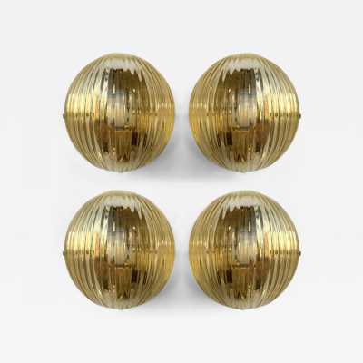Mid-Century Modern Space Age Yellow Gold Leaf Murano Glass Wall Sconces. Famous manufacturing designers like Barovier Toso Fabbian, Venini, Veronese, La Murrina, Aldo Carlo Nason, Stilnovo, Joe Colombo, Arteluce, Arredoluce, Lumi, Luci, Rggiani, Sciolari, Werner Pantone, Luigi Colani, Raak, Angelo Lelii, Angelo Brotto, Esperia, Francesco Bocola, Superstudio, Enrico Tronconi, Mario Bellini, Harvey Guzzini, Luigi Massoni, Martinelli, Pierre Cardin, Fabio Lenc