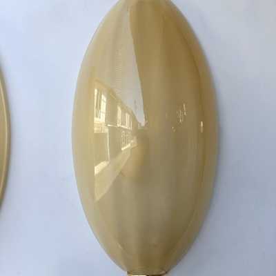 Yellow Murano glass wall sconces, Space Age style, Mid-Century Modern style, gold leaf and brass. Renowned manufacturers and designers: Barovier Toso, Fabbian, Venini, Veronese, La Murrina, Aldo Carlo Nason, Stilnovo, Joe Colombo, Arteluce, Arredoluce, Lumi, Luci, Rggiani, Sciolari, Werner Pantone, Luigi Colani, Raak, Angelo Lelii, Angelo Brotto, Esperia, Francesco Bocola, Superstudio, Enrico Tronconi, Mario Bellini, Harvey Guzzini, Luigi Massoni, Martinelli, Pierre Cardin, Fabio Lenci and Gio Po