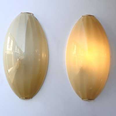 Yellow Murano glass wall sconces, Space Age style, Mid-Century Modern style, gold leaf and brass. Renowned manufacturers and designers: Barovier Toso, Fabbian, Venini, Veronese, La Murrina, Aldo Carlo Nason, Stilnovo, Joe Colombo, Arteluce, Arredoluce, Lumi, Luci, Rggiani, Sciolari, Werner Pantone, Luigi Colani, Raak, Angelo Lelii, Angelo Brotto, Esperia, Francesco Bocola, Superstudio, Enrico Tronconi, Mario Bellini, Harvey Guzzini, Luigi Massoni, Martinelli, Pierre Cardin, Fabio Lenci and Gio Po