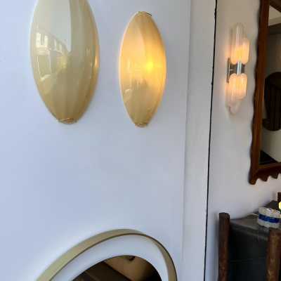 Yellow Murano glass wall sconces, Space Age style, Mid-Century Modern style, gold leaf and brass. Renowned manufacturers and designers: Barovier Toso, Fabbian, Venini, Veronese, La Murrina, Aldo Carlo Nason, Stilnovo, Joe Colombo, Arteluce, Arredoluce, Lumi, Luci, Rggiani, Sciolari, Werner Pantone, Luigi Colani, Raak, Angelo Lelii, Angelo Brotto, Esperia, Francesco Bocola, Superstudio, Enrico Tronconi, Mario Bellini, Harvey Guzzini, Luigi Massoni, Martinelli, Pierre Cardin, Fabio Lenci and Gio Po
