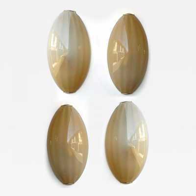 Yellow Murano glass wall sconces, Space Age style, Mid-Century Modern style, gold leaf and brass. Renowned manufacturers and designers: Barovier Toso, Fabbian, Venini, Veronese, La Murrina, Aldo Carlo Nason, Stilnovo, Joe Colombo, Arteluce, Arredoluce, Lumi, Luci, Rggiani, Sciolari, Werner Pantone, Luigi Colani, Raak, Angelo Lelii, Angelo Brotto, Esperia, Francesco Bocola, Superstudio, Enrico Tronconi, Mario Bellini, Harvey Guzzini, Luigi Massoni, Martinelli, Pierre Cardin, Fabio Lenci and Gio Po