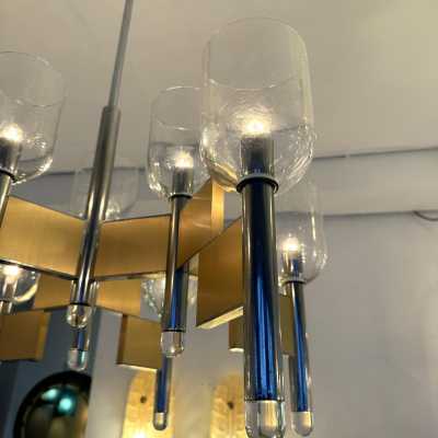 Space Age-style pendant chandelier, mid-century modern design, designed by Italian designer Gaetano Sciolari. Brass, chrome-plated metal, and Murano glass bowl. Famous creations such as Reggiani, Stilux, Stilkronen, Boulanger, and Esperia.