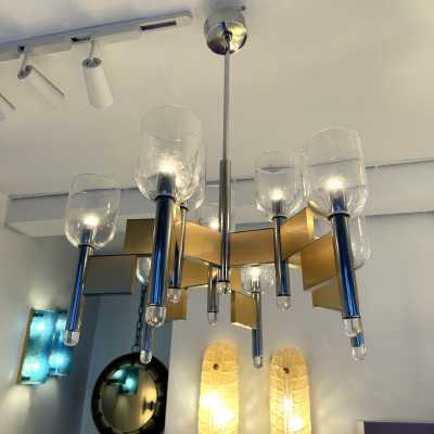 Space Age-style pendant chandelier, mid-century modern design, designed by Italian designer Gaetano Sciolari. Brass, chrome-plated metal, and Murano glass bowl. Famous creations such as Reggiani, Stilux, Stilkronen, Boulanger, and Esperia.
