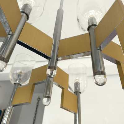 Space Age-style pendant chandelier, mid-century modern design, designed by Italian designer Gaetano Sciolari. Brass, chrome-plated metal, and Murano glass bowl. Famous creations such as Reggiani, Stilux, Stilkronen, Boulanger, and Esperia.