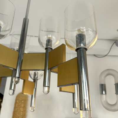 Space Age-style pendant chandelier, mid-century modern design, designed by Italian designer Gaetano Sciolari. Brass, chrome-plated metal, and Murano glass bowl. Famous creations such as Reggiani, Stilux, Stilkronen, Boulanger, and Esperia.