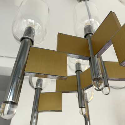 Space Age-style pendant chandelier, mid-century modern design, designed by Italian designer Gaetano Sciolari. Brass, chrome-plated metal, and Murano glass bowl. Famous creations such as Reggiani, Stilux, Stilkronen, Boulanger, and Esperia.