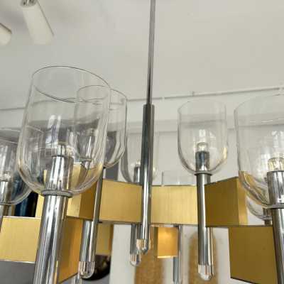 Space Age-style pendant chandelier, mid-century modern design, designed by Italian designer Gaetano Sciolari. Brass, chrome-plated metal, and Murano glass bowl. Famous creations such as Reggiani, Stilux, Stilkronen, Boulanger, and Esperia.