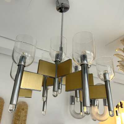 Space Age-style pendant chandelier, mid-century modern design, designed by Italian designer Gaetano Sciolari. Brass, chrome-plated metal, and Murano glass bowl. Famous creations such as Reggiani, Stilux, Stilkronen, Boulanger, and Esperia.