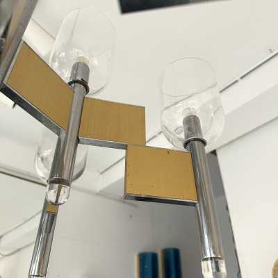 Space Age-style pendant chandelier, mid-century modern design, designed by Italian designer Gaetano Sciolari. Brass, chrome-plated metal, and Murano glass bowl. Famous creations such as Reggiani, Stilux, Stilkronen, Boulanger, and Esperia.