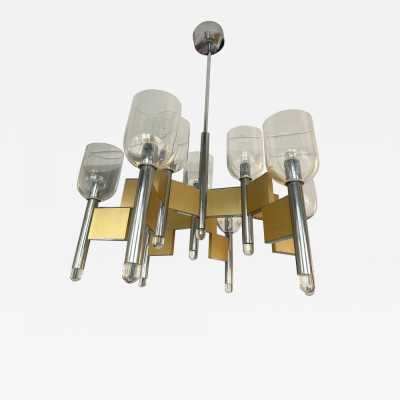 Space Age-style pendant chandelier, mid-century modern design, designed by Italian designer Gaetano Sciolari. Brass, chrome-plated metal, and Murano glass bowl. Famous creations such as Reggiani, Stilux, Stilkronen, Boulanger, and Esperia.