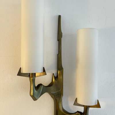 Pair or set of two Mid-Century Modern wall sconces by Maison Arlus. Cast gilt bronze and opaline glass. Rare model, beautiful patina. Original documentation available upon request. Renowned manufacturers such as Stilnovo, Arteluce, Arredoluce, Maison Jansen, Charles, Hollywood Regency, and Felix Agostini.