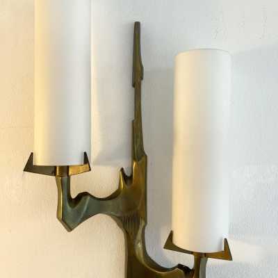 Pair or set of two Mid-Century Modern wall sconces by Maison Arlus. Cast gilt bronze and opaline glass. Rare model, beautiful patina. Original documentation available upon request. Renowned manufacturers such as Stilnovo, Arteluce, Arredoluce, Maison Jansen, Charles, Hollywood Regency, and Felix Agostini.