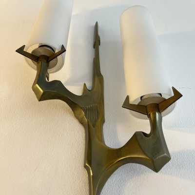 Pair or set of two Mid-Century Modern wall sconces by Maison Arlus. Cast gilt bronze and opaline glass. Rare model, beautiful patina. Original documentation available upon request. Renowned manufacturers such as Stilnovo, Arteluce, Arredoluce, Maison Jansen, Charles, Hollywood Regency, and Felix Agostini.