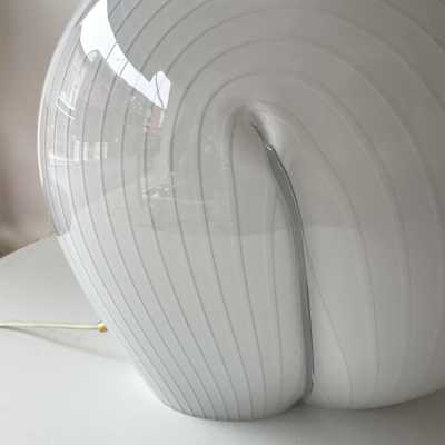 Murano glass shell table or bedside lamp with white stripes and brass details. Italian design by Veronese, Cenedese, Carlo Aldo Nason for Mazzega, La Murrina, Maison Charles, Jansen, Venini, Vistosi, Seguso, and Barovier Toso.