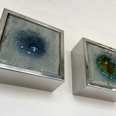 Pair of Mid-Century Modern Space Age wall sconces attributed to Raak. Blown bubbled glass and chrome metal. Famous manufacture like Italian design Venini, Vistosi, La Murrina, Seguso, Aldo Nason, Poliarte, Esperia, Angelo Brotto, Stilnovo, Arteluce, Arredoluce, Artemide, Pierre Cardin, Lumi, Luci, Angelo Lelii, Francesco Bocola, Superstudio, Enrico Tronconi, Mario Bellini, Harvey Guzzini, Luigi Massoni, Martinelli, Fabio Lenci, Gio Ponti.