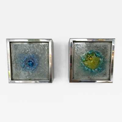 Pair of Mid-Century Modern Space Age wall sconces attributed to Raak. Blown bubbled glass and chrome metal. Famous manufacture like Italian design Venini, Vistosi, La Murrina, Seguso, Aldo Nason, Poliarte, Esperia, Angelo Brotto, Stilnovo, Arteluce, Arredoluce, Artemide, Pierre Cardin, Lumi, Luci, Angelo Lelii, Francesco Bocola, Superstudio, Enrico Tronconi, Mario Bellini, Harvey Guzzini, Luigi Massoni, Martinelli, Fabio Lenci, Gio Ponti.
