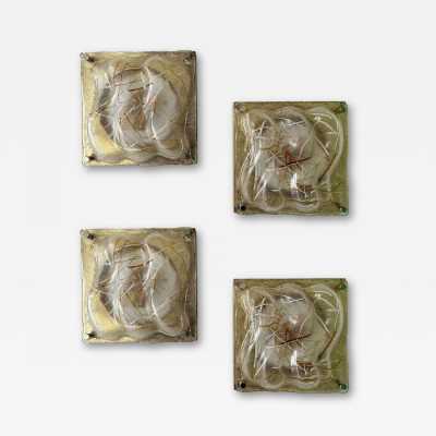 Pair of Space Age, Mid-Century Modern style wall lights in textured Murano glass and brass, with gold brushed brass finish to the sides. Can also be recessed. Renowned Italian design: Venini, Vistosi, La Murrina, Aldo Carlo Nason for Mazzega, Stilnovo, Joe Colombo, Arteluce, Arredoluce, Lumi, Luci, Rggiani, Sciolari, Werner Pantone, Luigi Colani, Raak, Angelo Lelii, Angelo Brotto, Esperia, Francesco Bocola, Superstudio, Enrico Tronconi, Mario Bellini, Harvey Guzzini, Luigi My