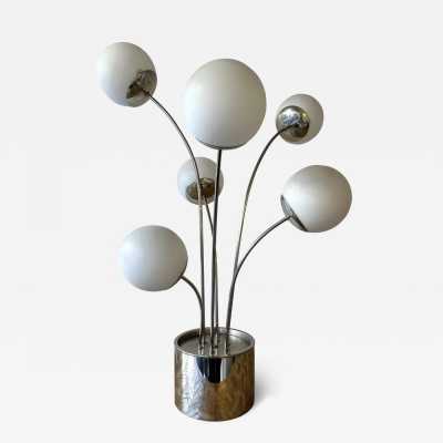 Mid-Century Modern Space Age Rare table or floor lamp by Italian designer Pia Guidetti Crippa for the publisher Lumi, chrome metal and opaline glass ball. Famous manufactures such as Sarfatti, Artemide, Arredoluce, Sciolari, Reggiani, Arlus, Stilnovo, Angelo Lelii Esperia, Hollywood Regency.