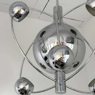 Astro Satellite Sputnik chandelier, space age, chrome-plated metal pendant light, six light points around the central sphere. Design attributed to the manufacturer-producer Reggiani. A typical Italian design of the mid-century modern period. Reggiani is a famous manufacturer, along with Gaetano Sciolari, Arredoluce, Arteluce, and Stilnovo.