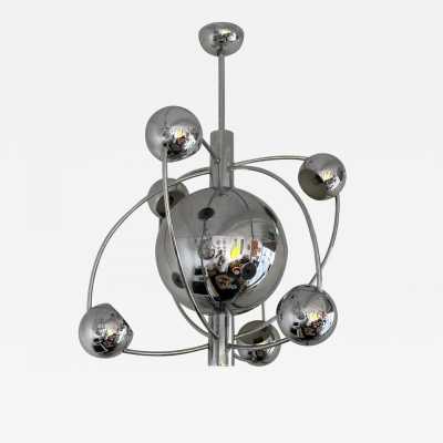 Astro Satellite Sputnik chandelier, space age, chrome-plated metal pendant light, six light points around the central sphere. Design attributed to the manufacturer-producer Reggiani. A typical Italian design of the mid-century modern period. Reggiani is a famous manufacturer, along with Gaetano Sciolari, Arredoluce, Arteluce, and Stilnovo.