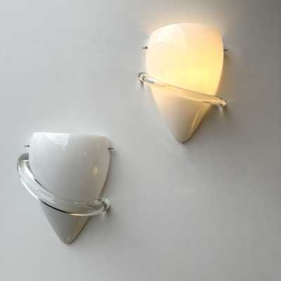 Pair of Swan wall lights in white and transparent Murano glass, by designer Tina Aufiero for the Italian design manufacturer Venini. Engraved, signed and dated 1995. Famous design such as Carlo Aldo Nason for Mazzega, Vistosi, La Murrina, Poliarte, Veronese, Seguso, Stilnovo, Artemide, Arredoluce, Arteluce.