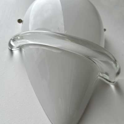 Pair of Swan wall lights in white and transparent Murano glass, by designer Tina Aufiero for the Italian design manufacturer Venini. Engraved, signed and dated 1995. Famous design such as Carlo Aldo Nason for Mazzega, Vistosi, La Murrina, Poliarte, Veronese, Seguso, Stilnovo, Artemide, Arredoluce, Arteluce.