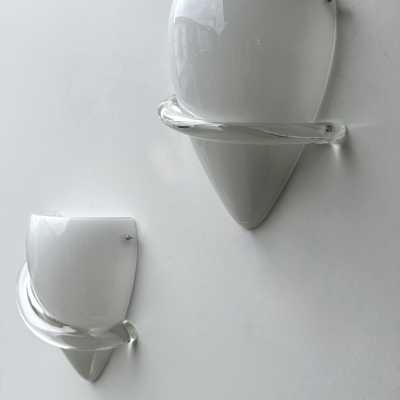 Pair of Swan wall lights in white and transparent Murano glass, by designer Tina Aufiero for the Italian design manufacturer Venini. Engraved, signed and dated 1995. Famous design such as Carlo Aldo Nason for Mazzega, Vistosi, La Murrina, Poliarte, Veronese, Seguso, Stilnovo, Artemide, Arredoluce, Arteluce.