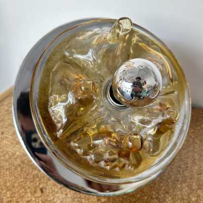 Pair of Culbuto Crater Mid-Century Modern Space Age table or bedside lamps, stalagmite in amber Murano glass and chrome metal by Italian designer Toni Zuccheri for VeArt. Famous Italian design like Venini, Vistosi, La Murrina, Aldo Nason, Stilnovo, Joe Colombo, Arteluce, Arredoluce, Lumi, Luci, Rggiani, Sciolari, Werner Pantone, Luigi Colani, Raak, Angelo Lelii, Angelo Brotto, Esperia, Francesco Bocola, Superstudio, Enrico Tronconi, Mario Bellini, Harvey Guzzini, Luigi Massoni, Martinelli, P