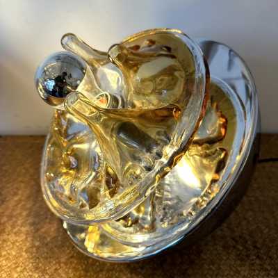 Pair of Culbuto Crater Mid-Century Modern Space Age table or bedside lamps, stalagmite in amber Murano glass and chrome metal by Italian designer Toni Zuccheri for VeArt. Famous Italian design like Venini, Vistosi, La Murrina, Aldo Nason, Stilnovo, Joe Colombo, Arteluce, Arredoluce, Lumi, Luci, Rggiani, Sciolari, Werner Pantone, Luigi Colani, Raak, Angelo Lelii, Angelo Brotto, Esperia, Francesco Bocola, Superstudio, Enrico Tronconi, Mario Bellini, Harvey Guzzini, Luigi Massoni, Martinelli, P