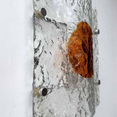 Pair of mid-century space age wall sconces in amber and clear textured Murano glass and metal backplate by Toni Zuccheri for Mazzega Manufacture. Famous Italian design like Venini, Vistosi, La Murrina, Aldo Nason, Stilnovo, Joe Colombo, Arteluce, Arredoluce, Lumi, Luci, Rggiani, Sciolari, Werner Pantone, Luigi Colani, Raak, Angelo Lelii, Angelo Brotto, Esperia, Francesco Bocola, Superstudio, Enrico Tronconi, Mario Bellini, Harvey Guzzini, Luigi Massoni, Martinelli, Pierre Cardin