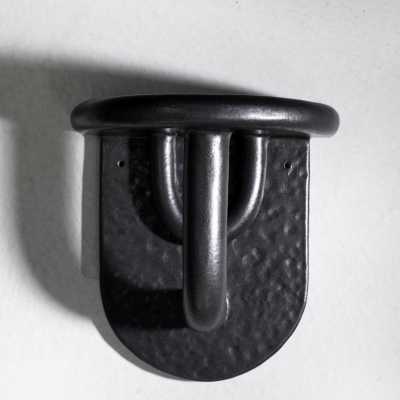 Black glazed stoneware wall console by Clémentine Dupré, 2026.
