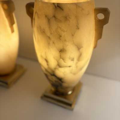 Pair of lamps in alabaster and polished brass