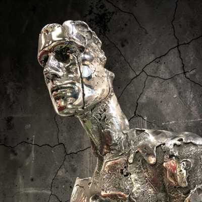 Metal face of a man