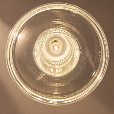 Pamio & Toso pendant light seen from below: clear glass shade and bulb