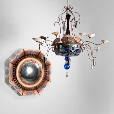 Dubreuil and Dixon chandelier, 1985, hung near an octagonal copper witch mirror by Dubreuil