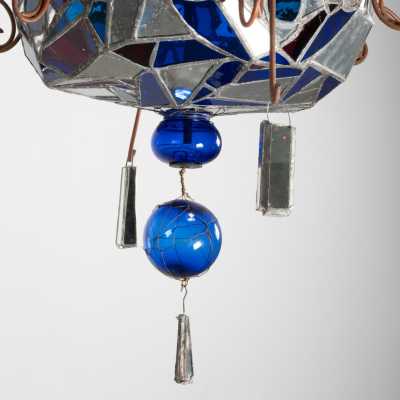 Detail of the underside of the Dubreuil and Dixon chandelier: led glass and mirrors, blue spheres, mirrored pendants