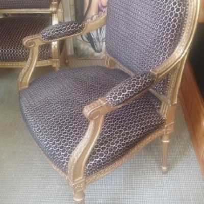 Paire de fauteuils en bois doré de style Louis XVI, XIXème siècle