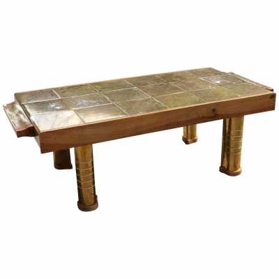 Table basse en céramique dorée. Année 1970