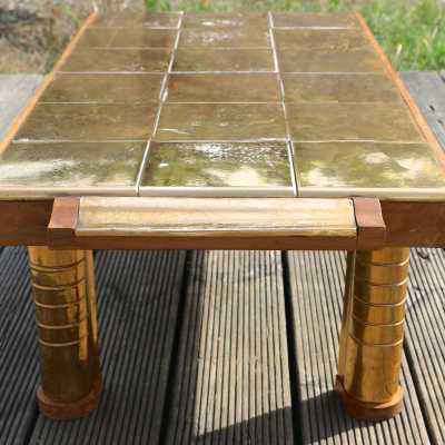 Table basse en céramique dorée. Année 1970